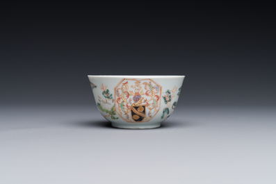 A Chinese famille rose cup and saucer with the arms of Beekman of Zeeland for the Dutch market, Yongzheng