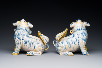 A pair of Portuguese polychrome faience sculptures of lions, 17/18th C.