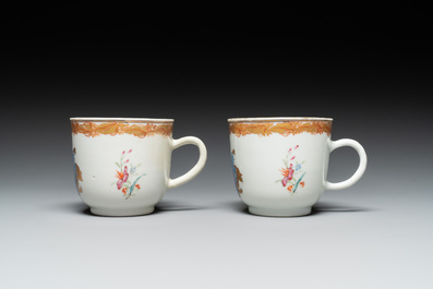 A pair of monogrammed Chinese puce-enamelled plates and a pair of armorial cups and saucers, Yongzheng/Qianlong