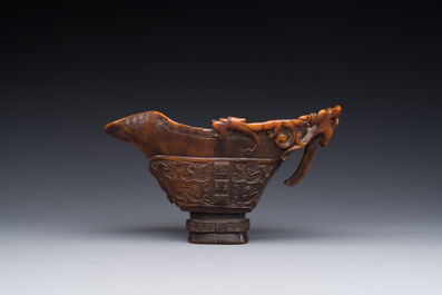 A Chinese carved rhinoceros horn 'libation cup' with chilong design, 17/18th C.