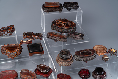 An extensive collection of 137 varied Chinese small wooden stands, 19/20th C.