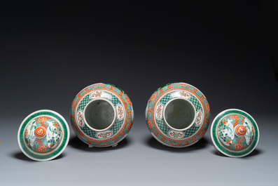 A pair of Chinese famille verte 'Wen Wang Fang Xian 文王訪賢' vases and covers, 19th C.