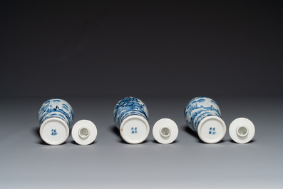 A Chinese blue and white garniture of five vases with landscape design, 19th C.