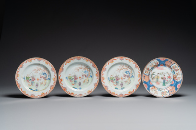 A pair of Chinese famille rose bowls and four plates, Yongzheng/Qianlong