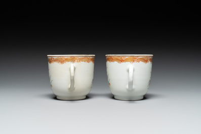 A pair of monogrammed Chinese puce-enamelled plates and a pair of armorial cups and saucers, Yongzheng/Qianlong