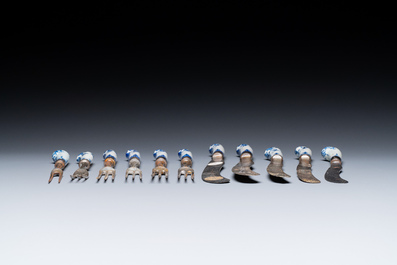 Eleven blue and white soft paste porcelain knife and fork handles, probably Saint-Cloud, France, 1st half 18th C.