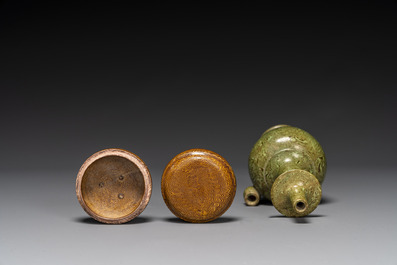 A Chinese yellow-glazed marbled covered box and a green-glazed marbled ewer, Tang/Song