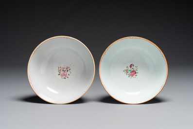 A pair of Chinese famille rose bowls and four plates, Yongzheng/Qianlong