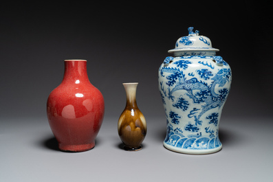 Two Chinese monochrome-glazed vases and a blue and white covered vase, 19th C.