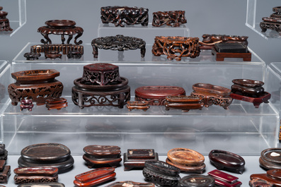 An extensive collection of 137 varied Chinese small wooden stands, 19/20th C.