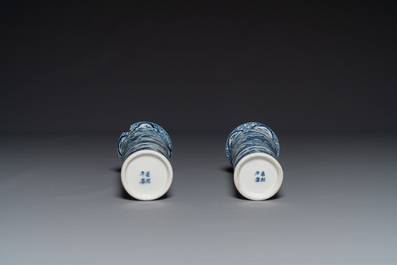 A Chinese blue and white garniture of five vases with landscape design, 19th C.