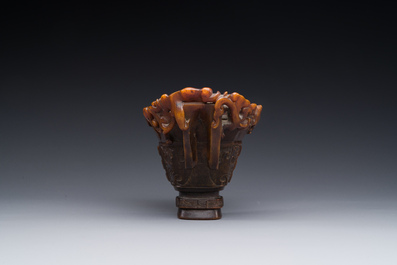 A Chinese carved rhinoceros horn 'libation cup' with chilong design, 17/18th C.