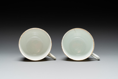 A pair of monogrammed Chinese puce-enamelled plates and a pair of armorial cups and saucers, Yongzheng/Qianlong