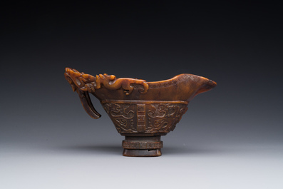 A Chinese carved rhinoceros horn 'libation cup' with chilong design, 17/18th C.