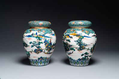 A pair of Japanese Kutani covered vases with landscape design, Meiji, 19th C.