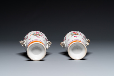 A pair of Chinese famille rose 'cornucopia' vases with chilong handles, Qianlong