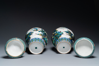 A pair of Japanese Kutani covered vases with landscape design, Meiji, 19th C.