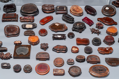 An extensive collection of 137 varied Chinese small wooden stands, 19/20th C.