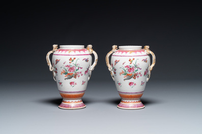 A pair of Chinese famille rose 'cornucopia' vases with chilong handles, Qianlong