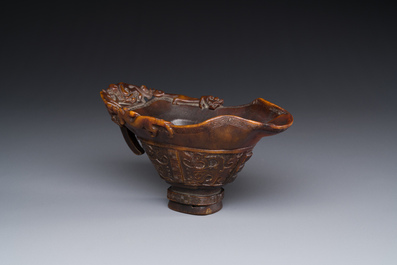 A Chinese carved rhinoceros horn 'libation cup' with chilong design, 17/18th C.