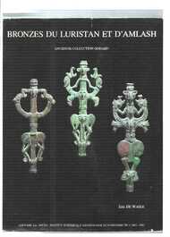 A collection of three bronze axes, a mirror and an anthropomorphic idol with two dragon heads, Luristan, 2000 B.C and earlier