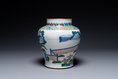 A Chinese wucai 'qilin' baluster vase, 19th C.