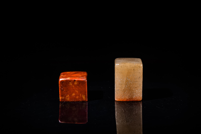 A Chinese 'chicken blood' soapstone seal and a russet jade seal, Qing