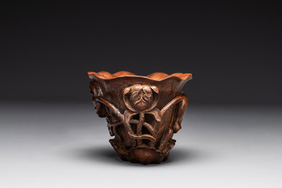 A Chinese carved bamboo 'lotus' libation cup, 17/18th C.