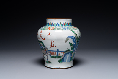 A Chinese wucai 'qilin' baluster vase, 19th C.