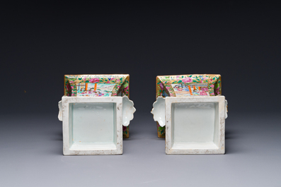 A pair of Chinese Canton famille rose bough pots and covers, 19th C.