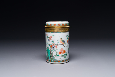 A Chinese famille verte cylindrical box and cover with gilt bronze mount, Kangxi