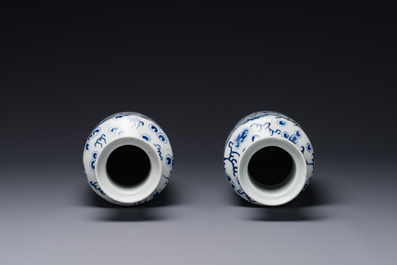 A pair of Chinese blue and white 'Buddhist lion' vases, Kangxi mark, 19th C.