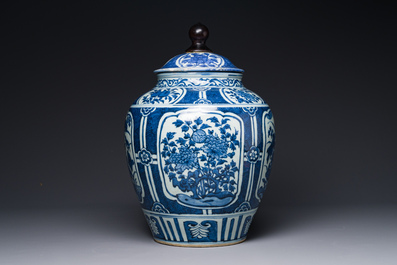 A Chinese blue and white jar and cover with floral design, Wanli