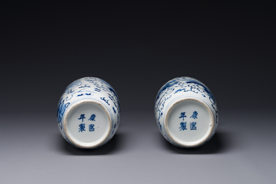 A pair of Chinese blue and white 'Buddhist lion' vases, Kangxi mark, 19th C.