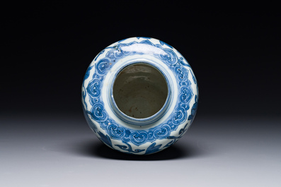 A Chinese blue and white 'Buddhist lion and lotus scroll' jar, Wanli