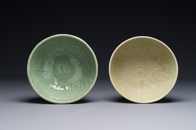 Two rare Chinese Longquan celadon bowls with figural anhua design, Yuan