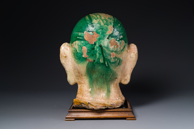 An imposing Chinese sancai glazed stoneware head of a monk, Yuan/Ming