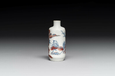 A Chinese blue, white and copper-red snuff bottle with inscription, 19th C.