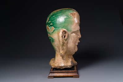 An imposing Chinese sancai glazed stoneware head of a monk, Yuan/Ming