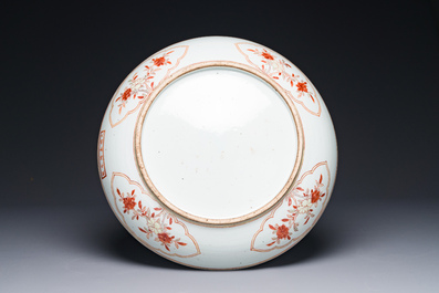 A Chinese wucai dish with figural and floral design, Jiajing mark, Transitional period