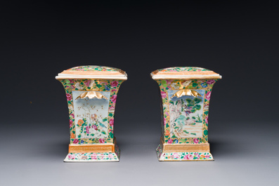 A pair of Chinese Canton famille rose bough pots and covers, 19th C.