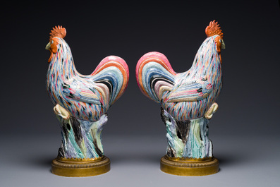 A pair of large Chinese famille rose models of roosters with gilt bronze mounts, Qianlong