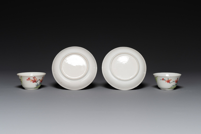 A pair of Chinese famille rose cups and saucers with horses, Yongzheng