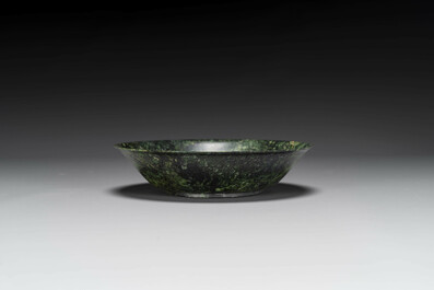 A Chinese dark green jade bowl, 18th C.