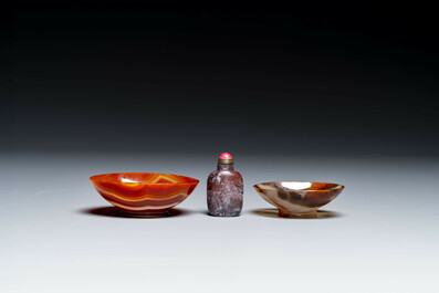 A group of Chinese carvings of lapis lazuli, pink quartz and other precious stones, with several stands, 19/20th C.