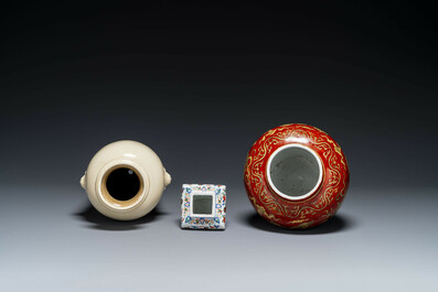 A Chinese cream-glazed vase and two 'dragon' vases, Jiajing and Wanli mark, 19/20th C.