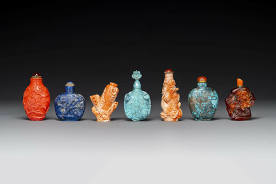 Seven varied Chinese snuff bottles of precious stone, red coral, glass and amber, 19th C.