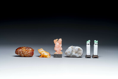 A group of Chinese carvings of lapis lazuli, pink quartz and other precious stones, with several stands, 19/20th C.
