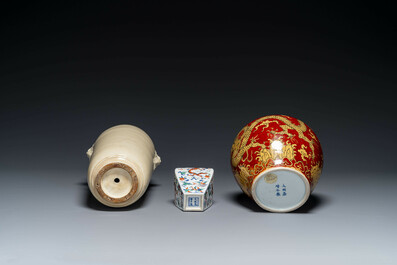 A Chinese cream-glazed vase and two 'dragon' vases, Jiajing and Wanli mark, 19/20th C.