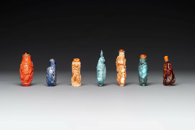 Seven varied Chinese snuff bottles of precious stone, red coral, glass and amber, 19th C.